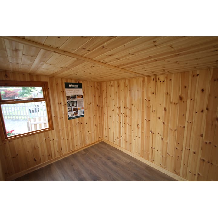 This picture illustrates the optional tongue and groove pine lining. It is carefully fitted to provide a pleasant working environment. As the walls and roof are insulated with thermal ufoil insulation when the building is lined, your garden room will be more than suitable for all year-round use.