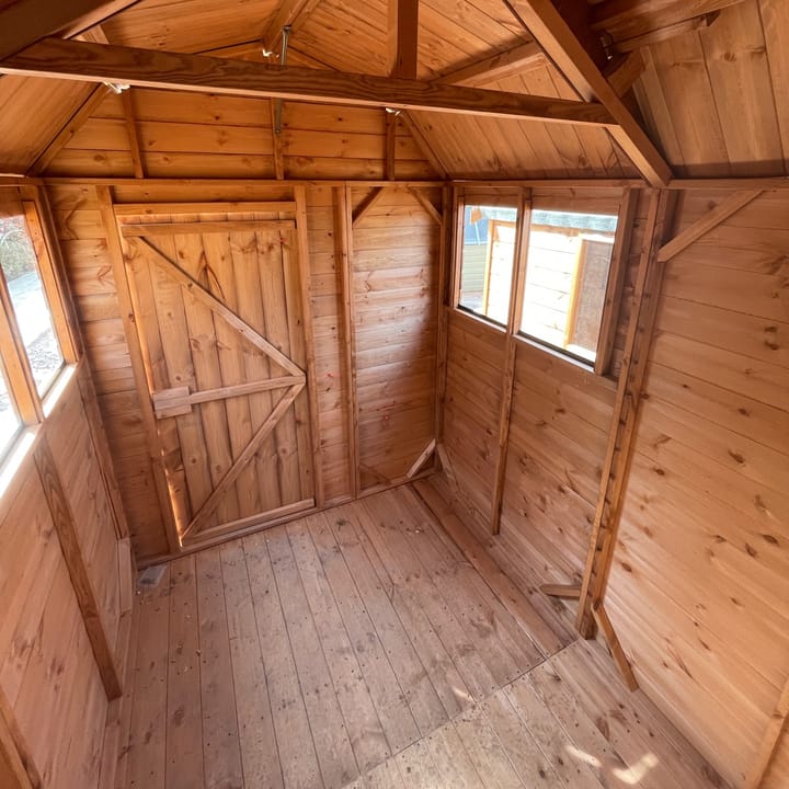 This internal view of a 6ft x 8ft Shedfast Dutch barn, shows the head room height provided by these uniquely styled roofs. 