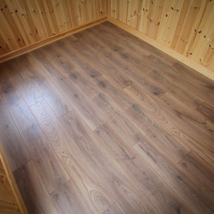 All Malvern Studio's include a solid timber floor as standard. For the complete finish and to complement the lining options available, you can choose to add deluxe laminate floor to your garden room in a choice of 10 styles. Pictured here is Renaissance Oak laminate flooring.