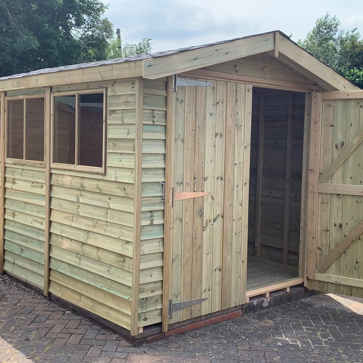 8ft x 12ft Heavy duty apex with Pressure Treated Barnstyle cladding, Double doors, and black felt tiled roof.